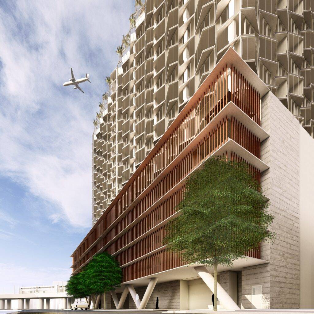 Modern architectural building with geometric design and an airplane flying above.
