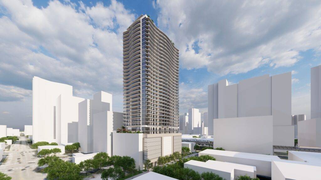 Modern high-rise building under a vibrant blue sky amidst a bustling urban landscape.