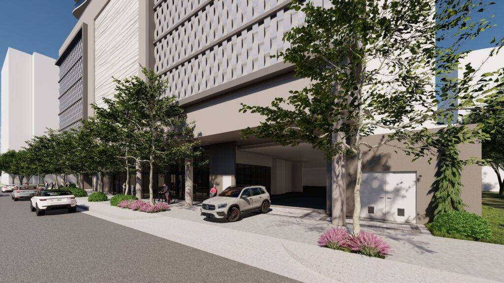 Modern city street view with trees and parked cars, showcasing contemporary urban architecture.