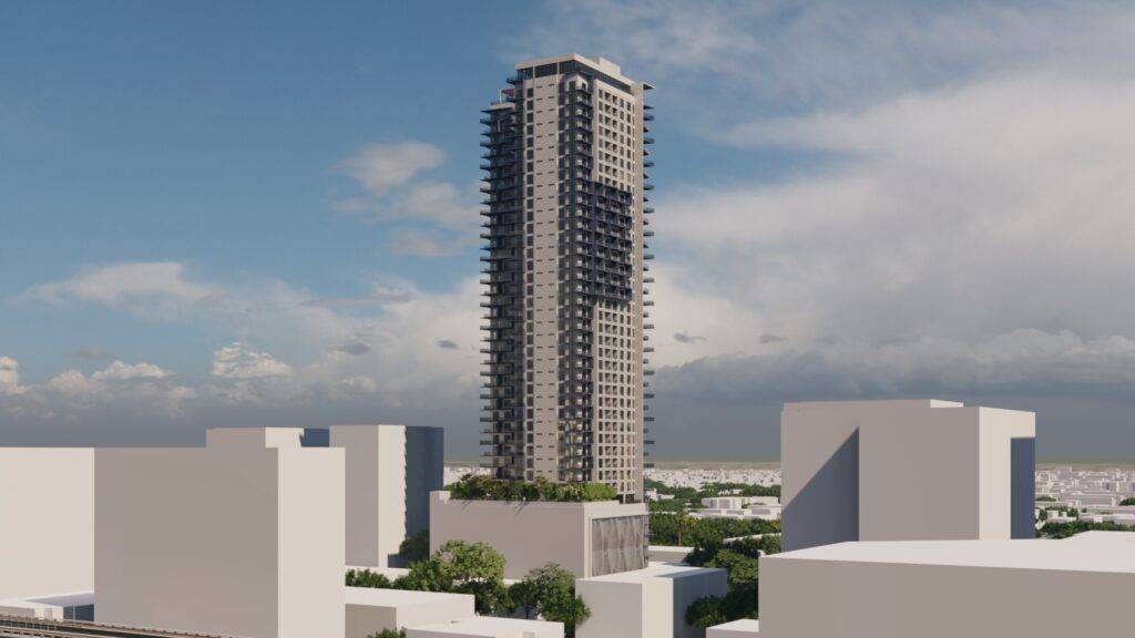 Modern skyscraper towering over cityscape on a clear day