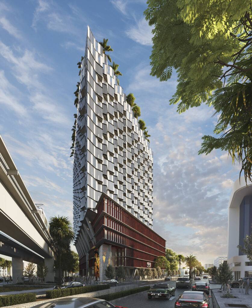 Modern urban skyscraper with unique architecture and lush greenery accents against a blue sky.