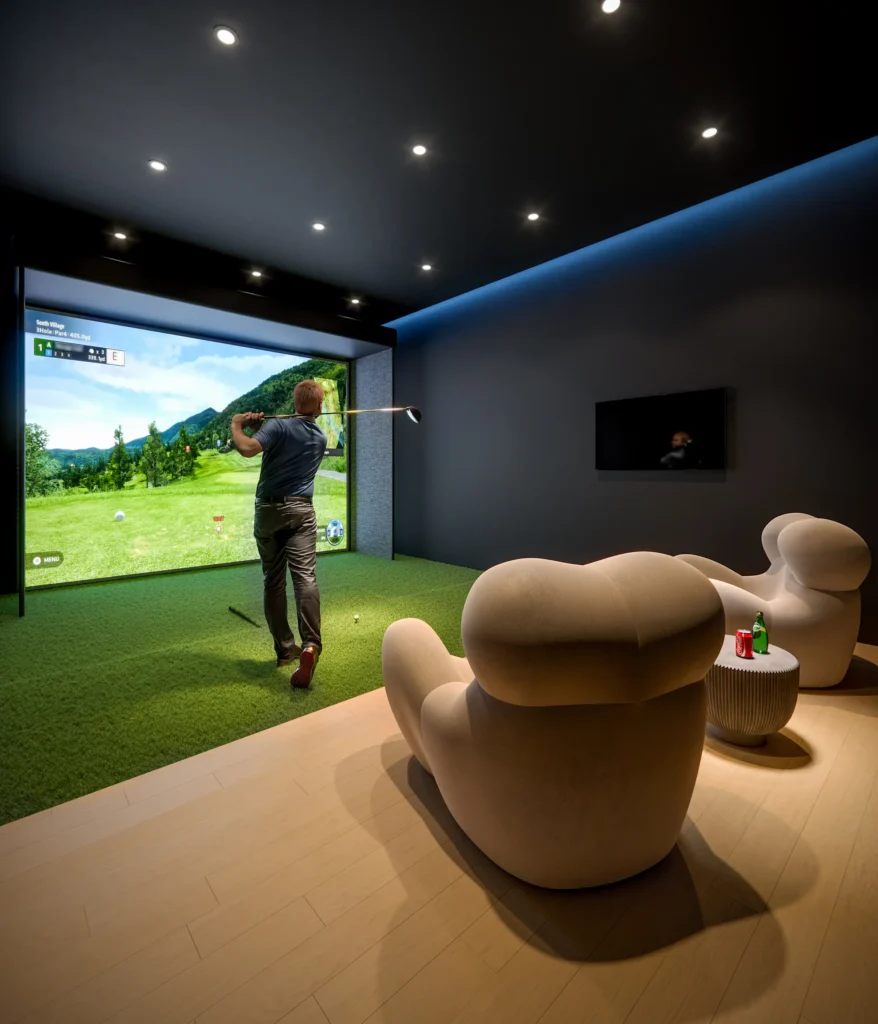 Person playing golf in a modern indoor simulator room with plush seating and ambient lighting.