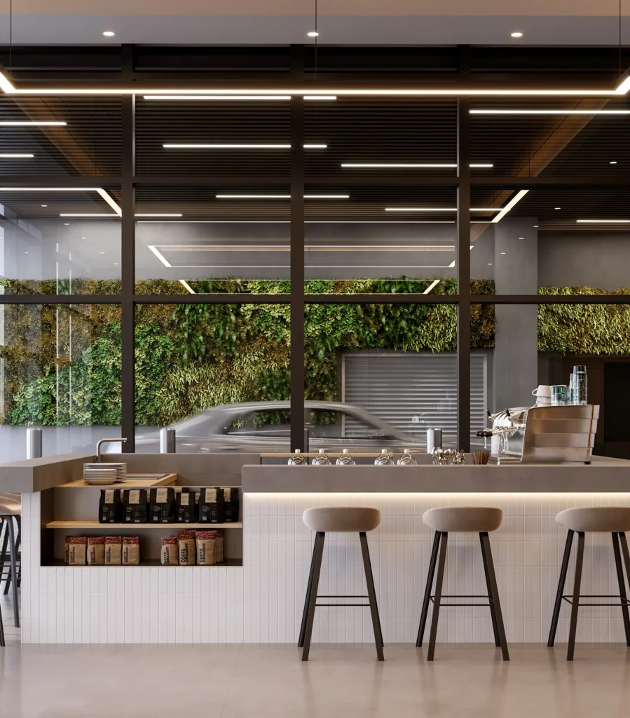 Modern coffee shop interior with sleek design and large glass windows.