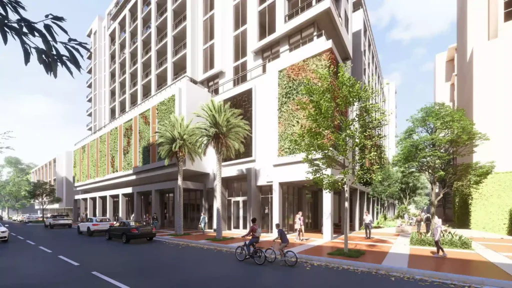 Modern urban building with vertical gardens and bustling street scene.