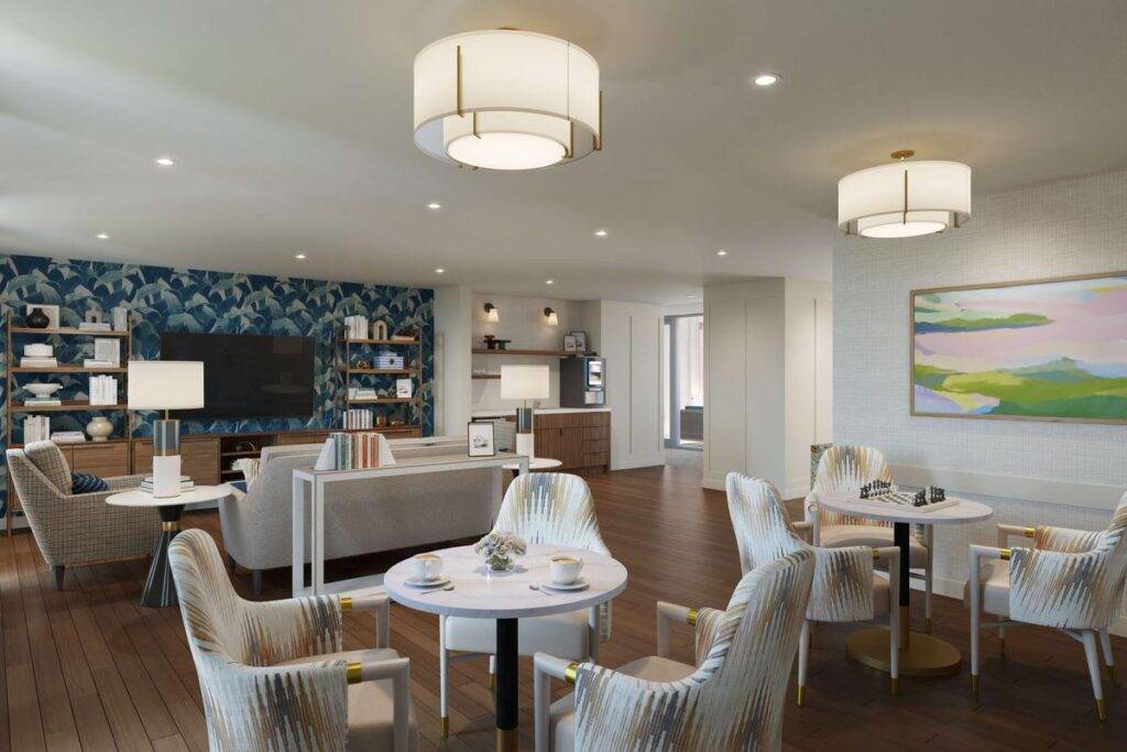 Modern living room with elegant lighting, stylish furniture, and a wall-mounted TV, featuring a blue patterned accent wall.