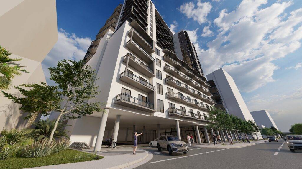 Modern high-rise building with balconies and street view