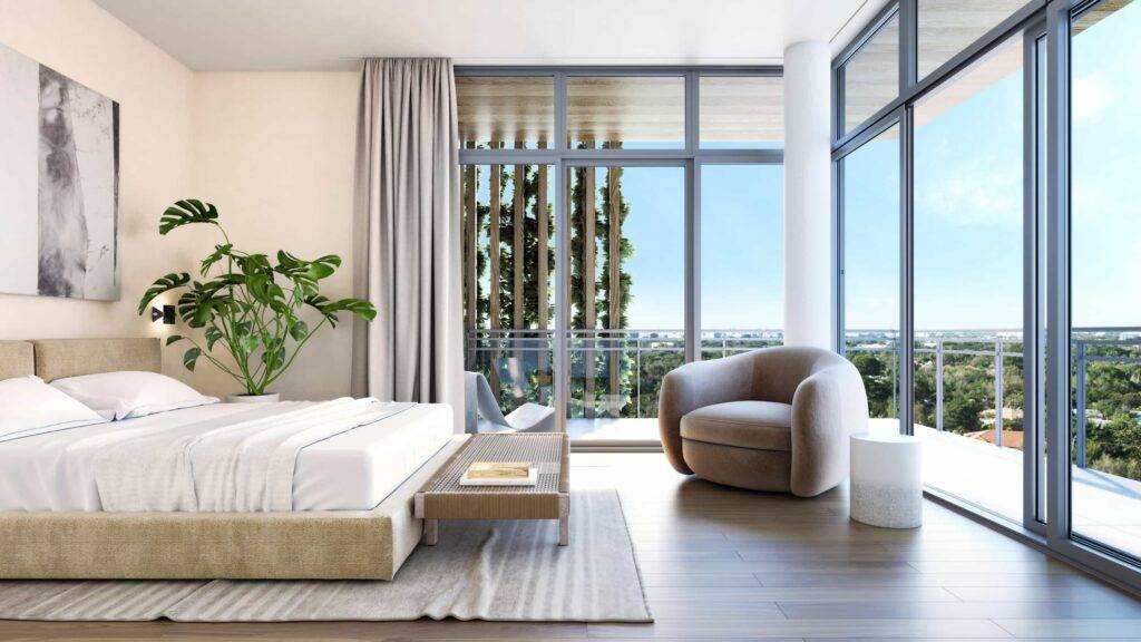 Modern bedroom with a large window, cozy armchair, and a leafy plant.