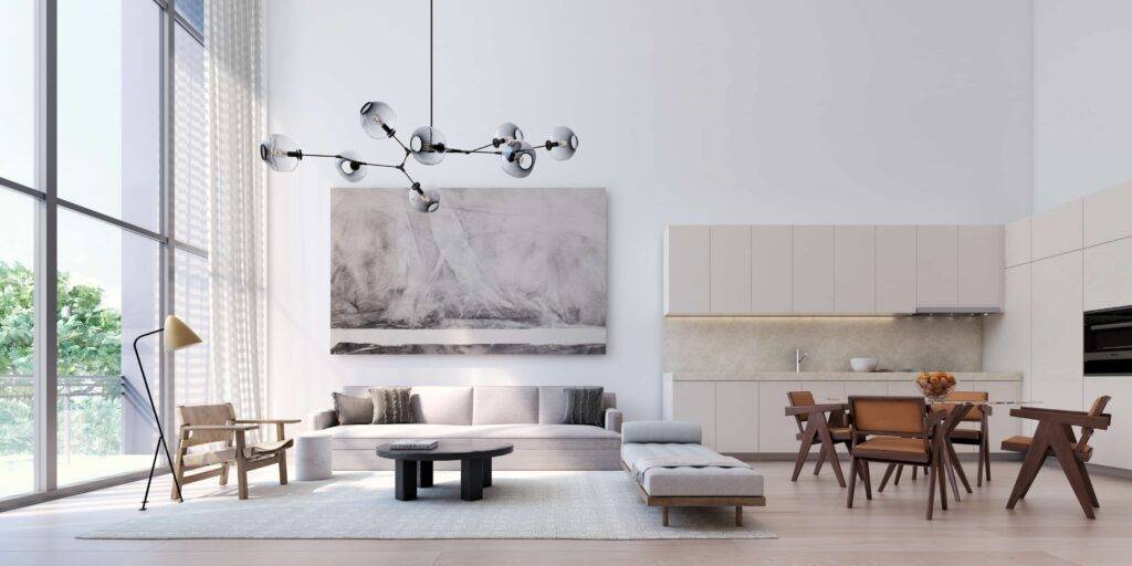 Modern open-concept living and dining area with stylish furniture and large windows.