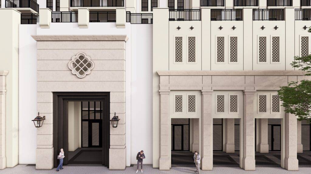 Architectural facade with ornate entrance and tall columns in Almeria.