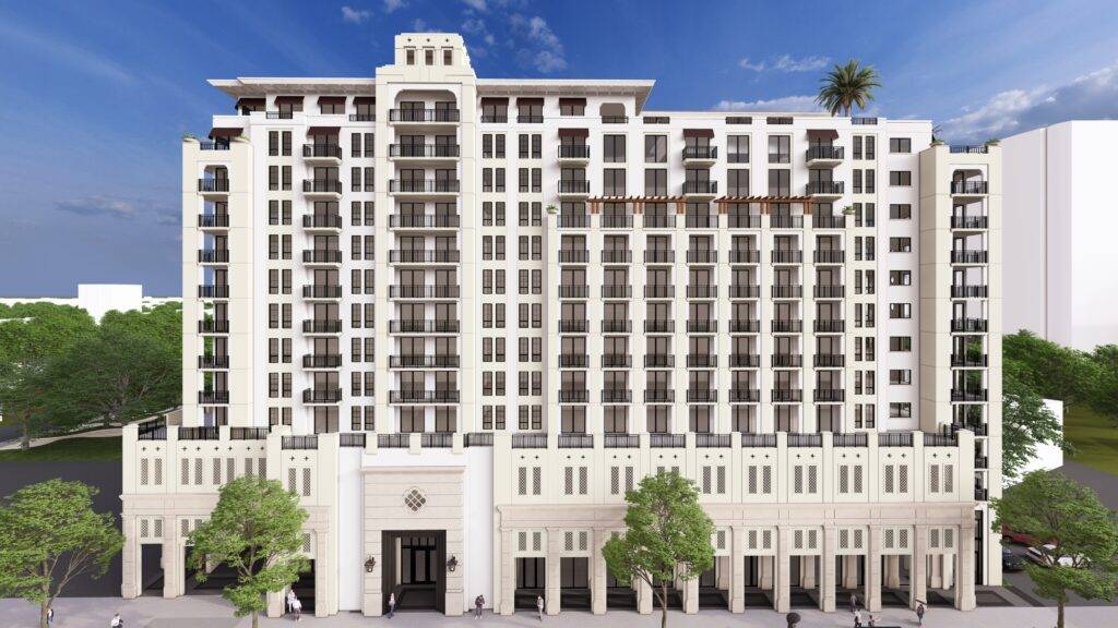 Modern high-rise building with elegant white facade and balconies.
