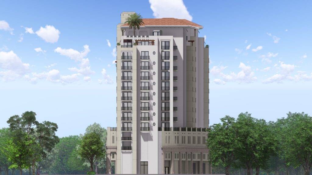 Modern architectural design of a tall, sleek building against a blue sky backdrop.