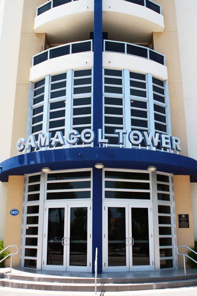 Camacol Tower entrance with blue and white architectural design