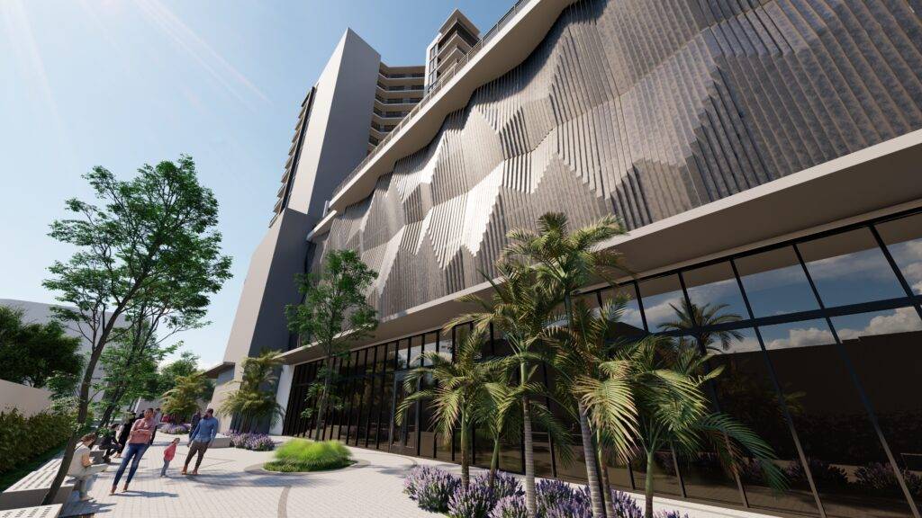 Modern architectural facade with geometric patterns on a sunny day.