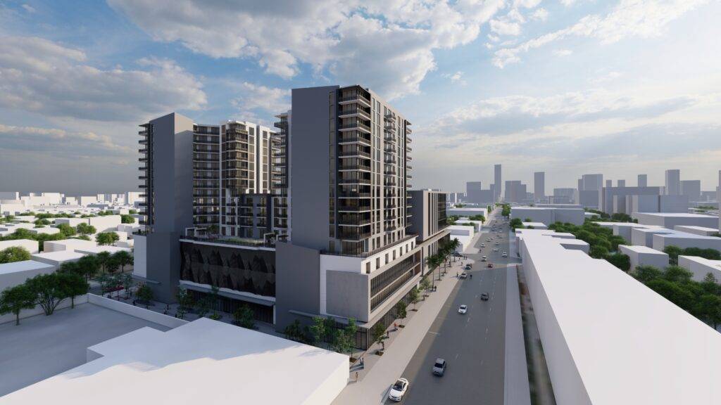 Modern urban apartment complex under a cloudy sky.