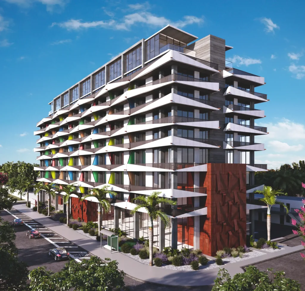 Modern multi-story building with colorful balconies and contemporary design.