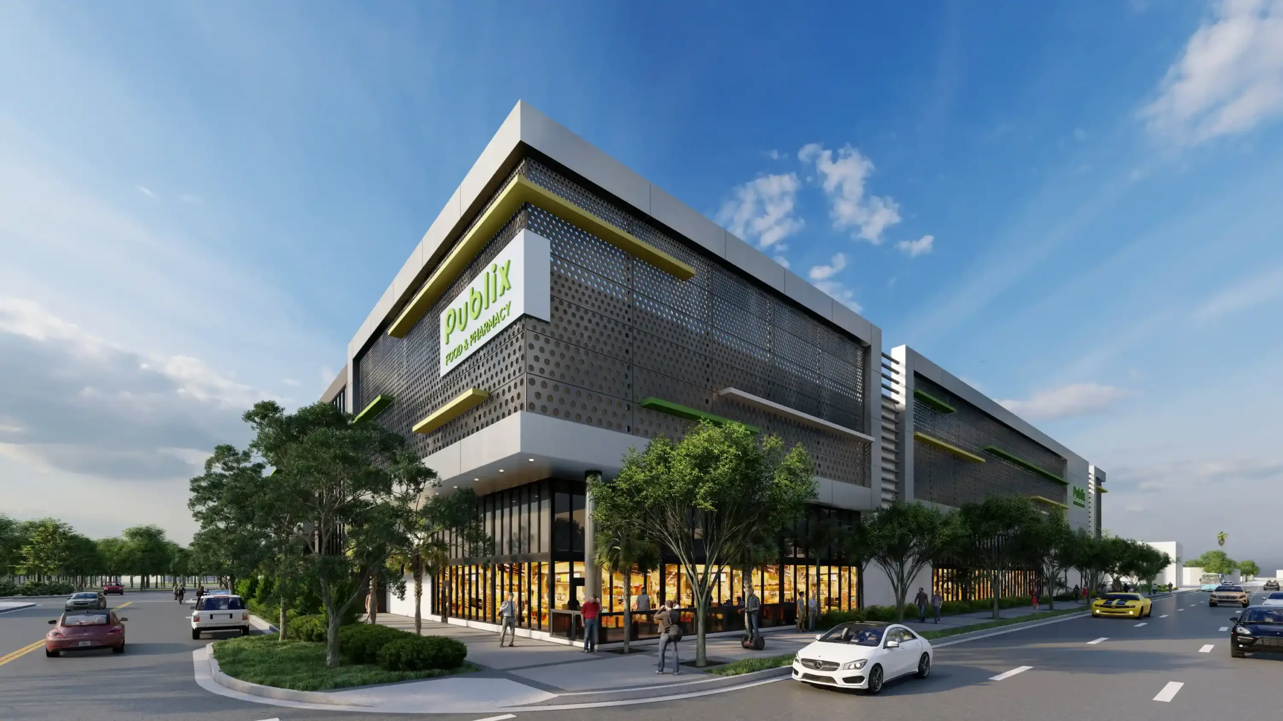 Modern architectural building under a clear blue sky with vibrant greenery and cars on the road.