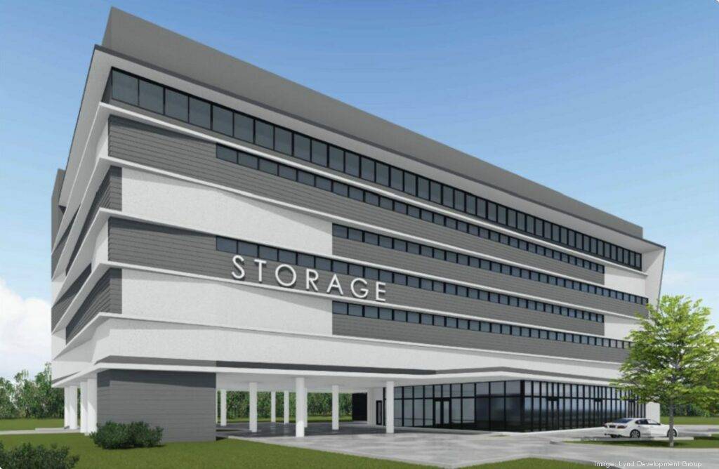 Modern multi-story storage facility with sleek architecture and ample parking space.
