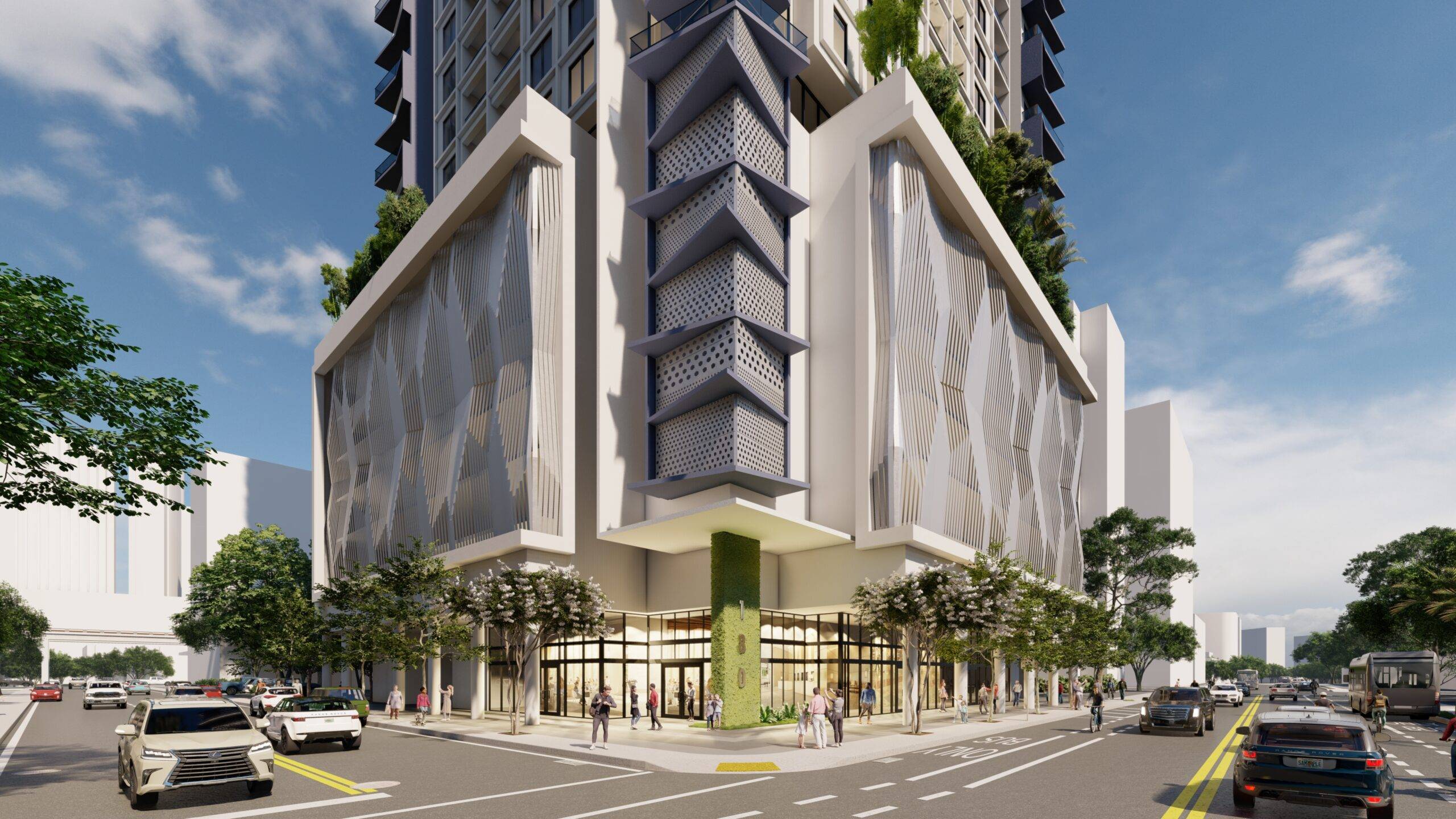 Modern high-rise building with architectural design and lush greenery on a sunny day.