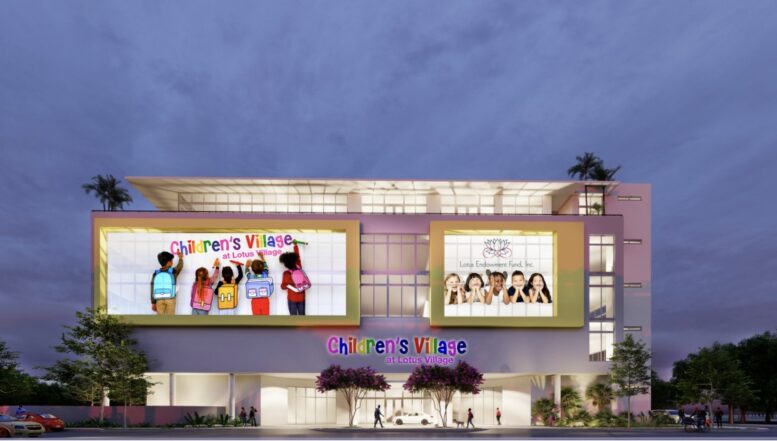 Modern children's center with vibrant signage under a dusky sky.