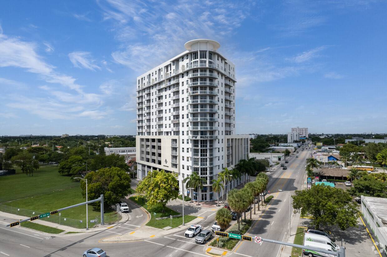 Modern high-rise building in Miami against a blue sky