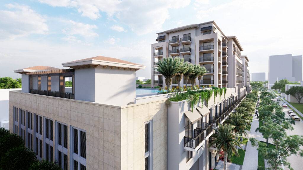 Modern architectural building with balconies and greenery under a cloudy sky.