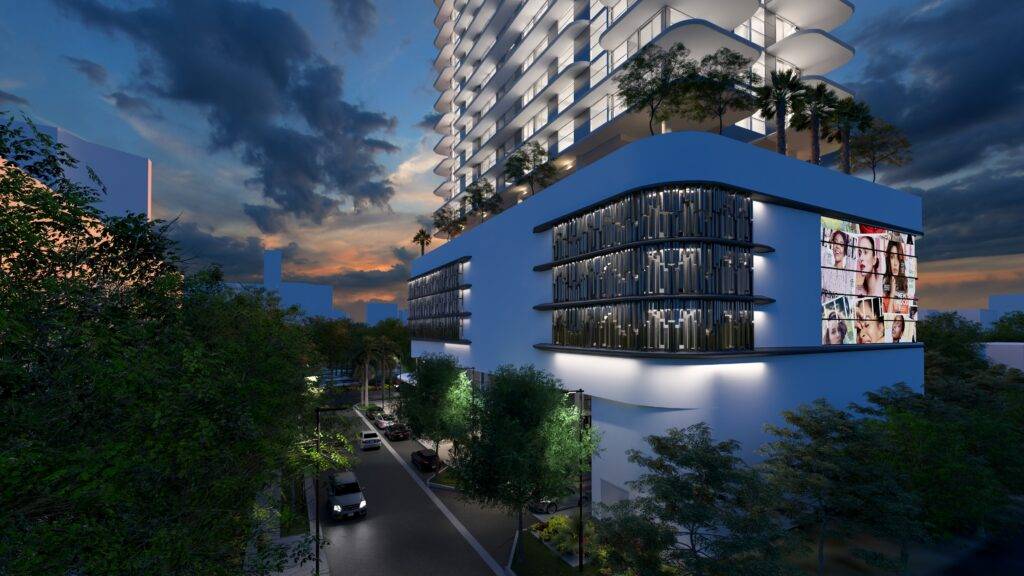 A modern high-rise building at dusk, featuring unique architectural design with illuminated windows and vibrant urban surroundings.