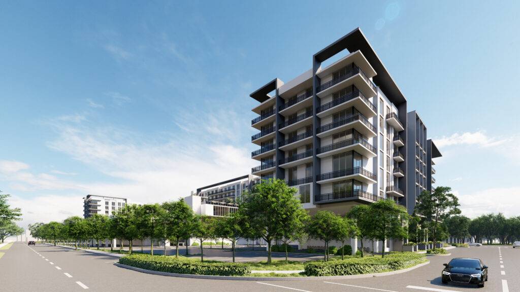 Modern multi-story apartment building with lush greenery on a sunny day.