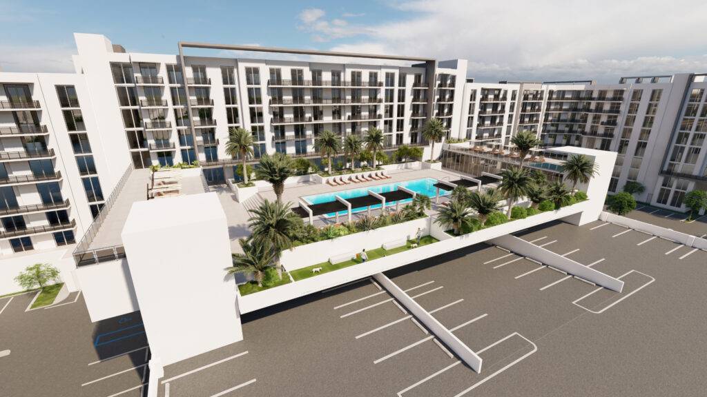 Modern residential complex with pool and lush greenery.