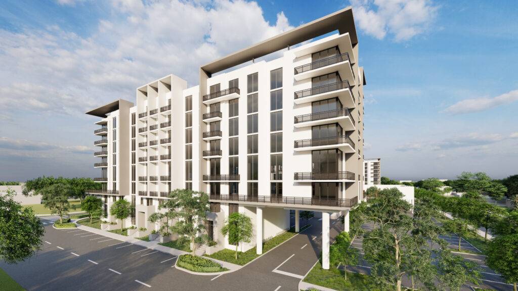 Modern residential building with sleek design and lush greenery.