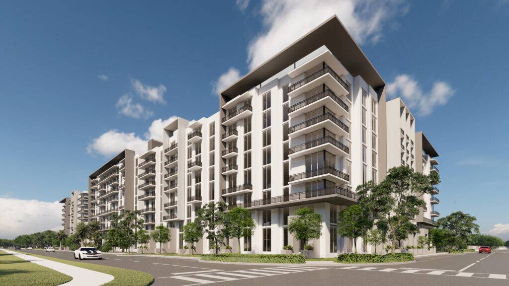 Modern apartment building with trees and a clear blue sky.