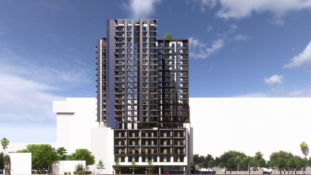 Modern high-rise building against a blue sky backdrop