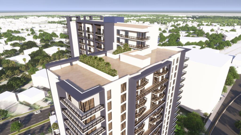 Modern high-rise building with rooftop greenery and balconies in an urban setting.