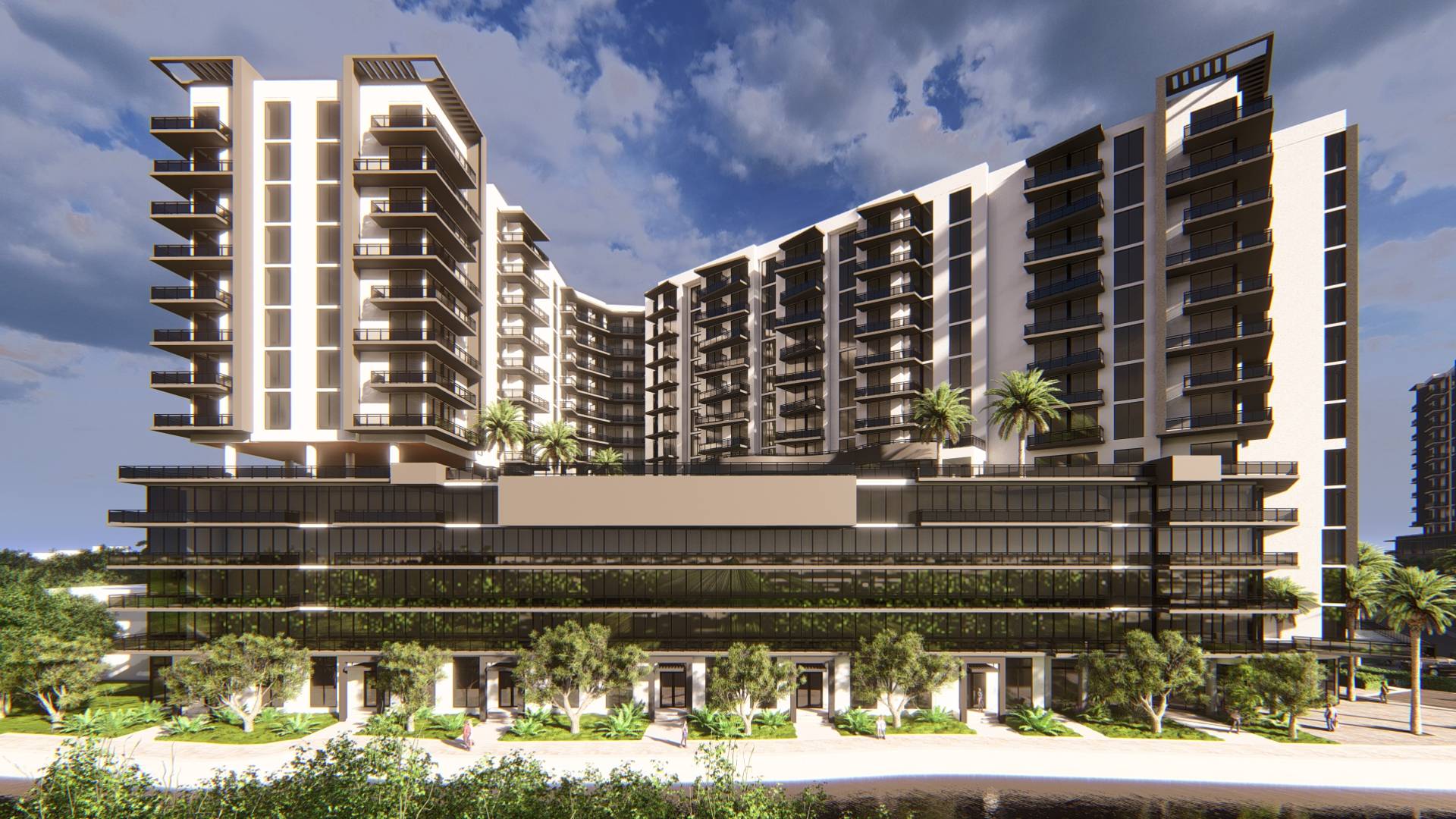 Modern architectural building with palm trees and dramatic sky in background