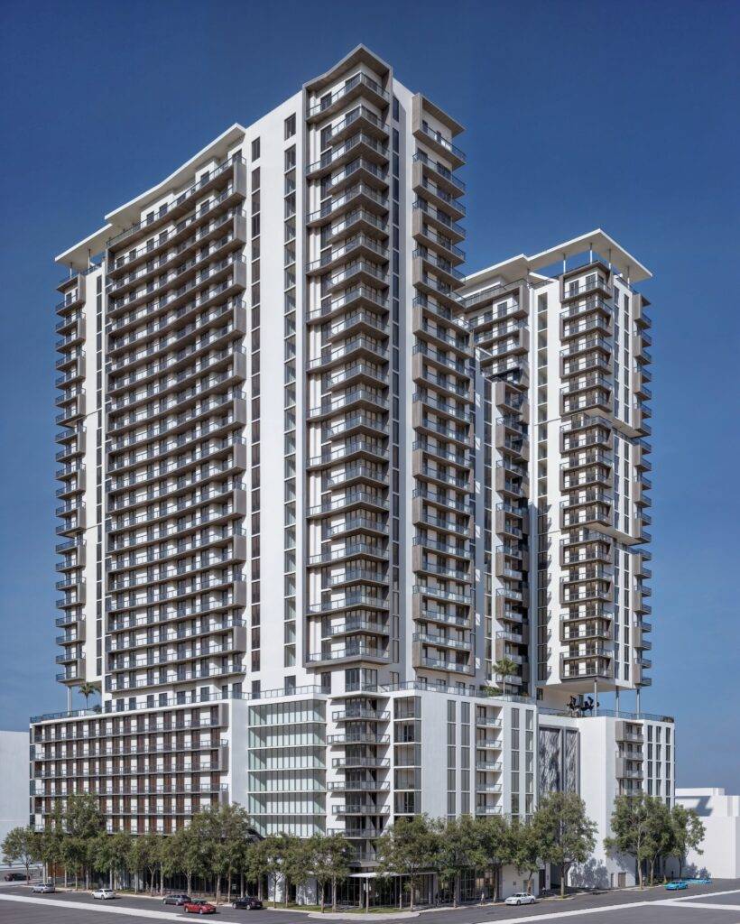 Modern high-rise building against a clear blue sky