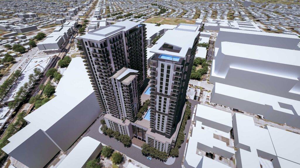 Aerial view of Merrick Parc's modern twin towers with surrounding urban landscape.