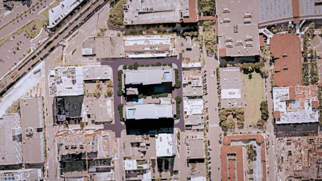 Aerial view of urban architecture with modern buildings and greenery.
