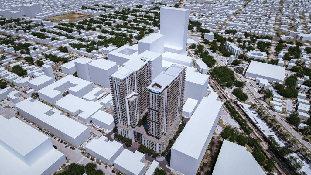 Aerial view of Merrick Parc high-rise amidst a bustling urban landscape