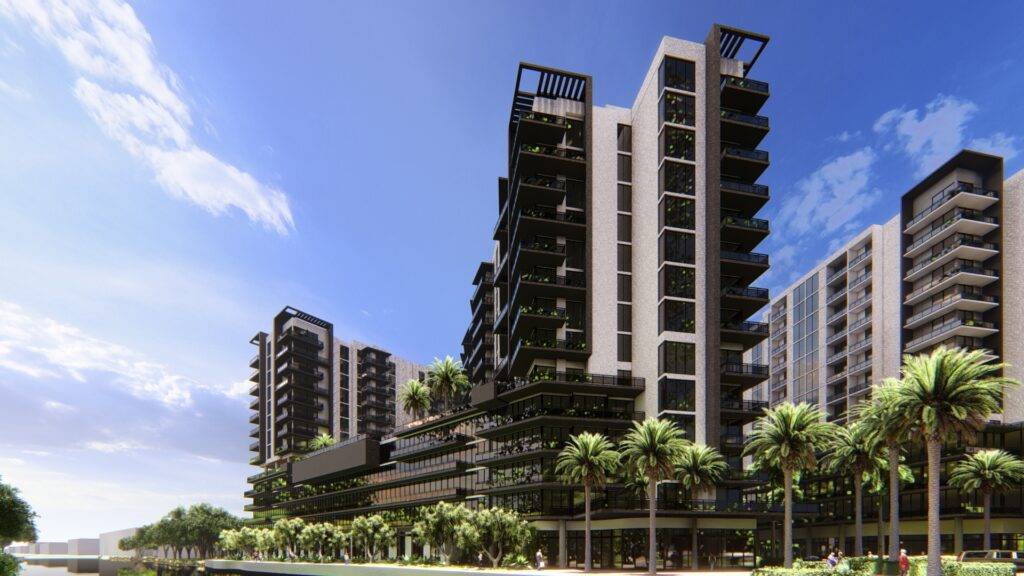 Modern apartment buildings with palm trees under a clear blue sky.