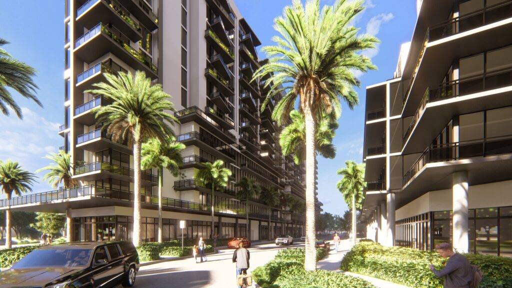 Modern high-rise buildings with palm trees lining a sunlit street.