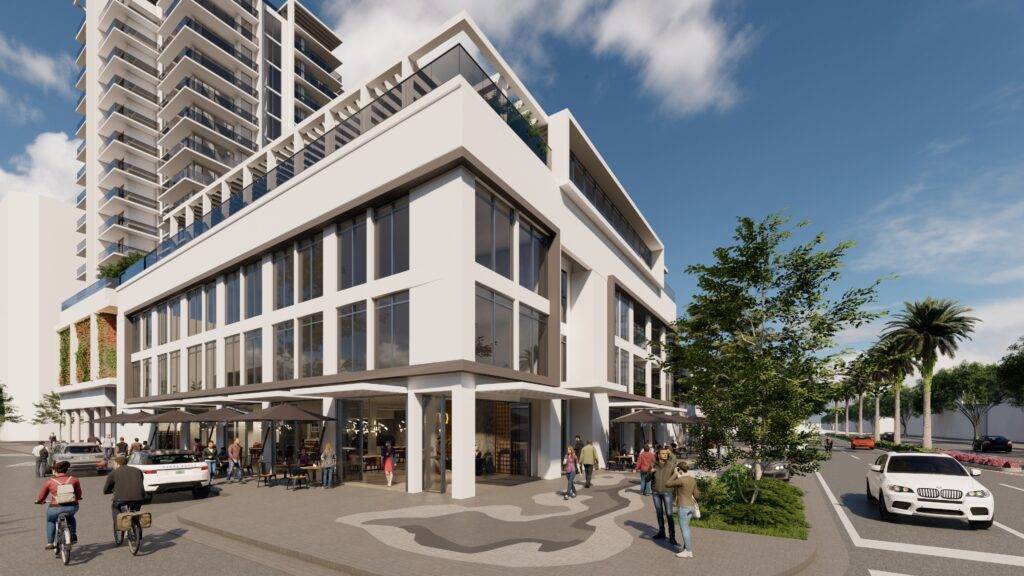 Modern urban building with people walking and cycling nearby.