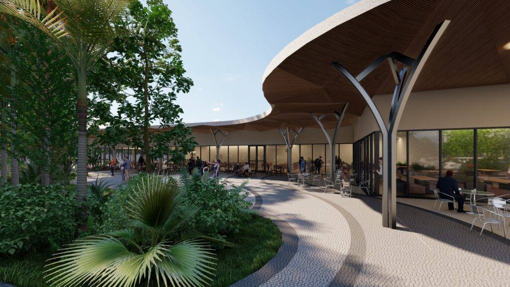 Modern architectural building with curved wooden roofs and lush greenery