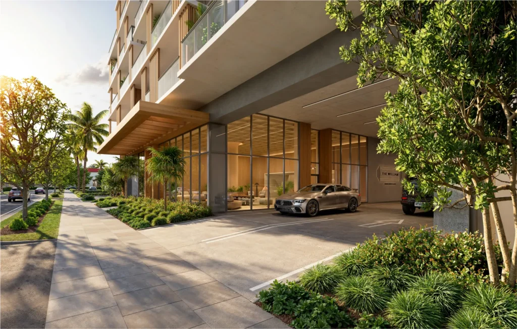 luxury apartment building entrance with cars