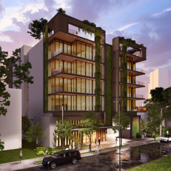 Modern eco-friendly building with lush greenery and large glass windows.